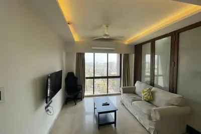 Image de Business-Ready Apt near Jio World Centre | 1br + Gym + Pool