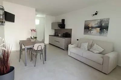 Image de L'olivo- Accommodations 5 minutes from Gardaland, in the quiet among vineyards and olive trees.