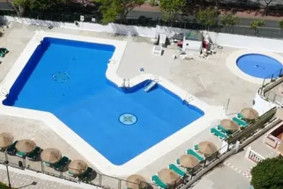 Image de SpainBreaks | Apt familial à Benalmádena, 2 chambres, 2 piscines, Wi-Fi et Airco