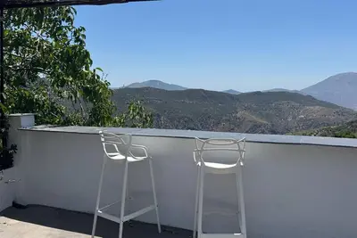 Image de Appartement 'Chaparra Pitres Apart Ferreirola' avec vue sur la montagne, piscine partagée et Wi-Fi