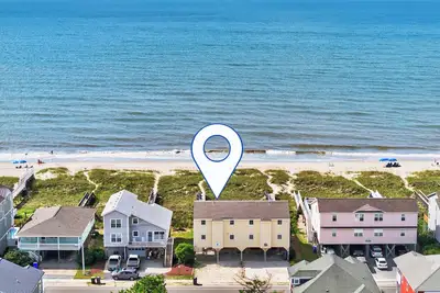 Image de Just A Touch in Ocean Isle Beach, a spacious 6-bedroom retreat perfect for up to 16 guests.