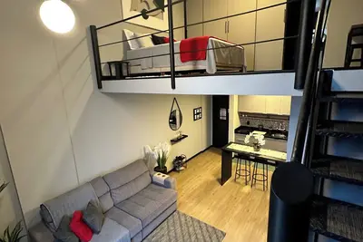 Image de The loft is centrally located, has a hot tub, a privileged view, a swimming pool, and a gym.