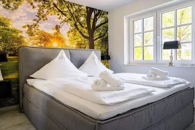 Image de Appartement de vacances à Hage avec piscine