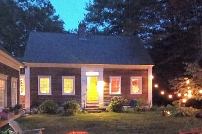 Image de Cape on wildlife sanctuary, with lake, ski resort, and college town close by.