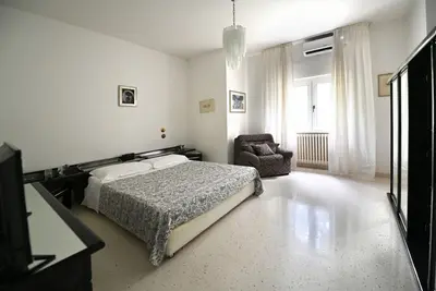 Image de Roomy and bright 140 sqm apartment, accommodating up to 4 people, located on the first floor of a building without an elevator. The property is located in a semi-central area of ​​Matera, well-served by public transport and a short distance from the c