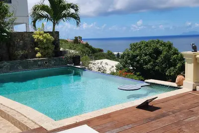 Image de Peaceful views and tranquilly awaits you  2-bdrm Villa in Belair, Ac, Pool, Wifi