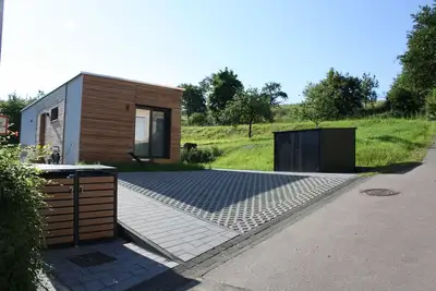 Image de Great tiny house in the Eifel - hiking, chilling, biking - with sauna and wallbox