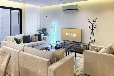 Image de bnbme | Modern Apartment + Maid’s Room | 17 min to Kafd