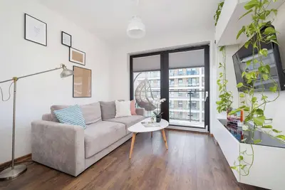 Image de Dąbska 24 Kraków | Light Grey Apartment with Balcony