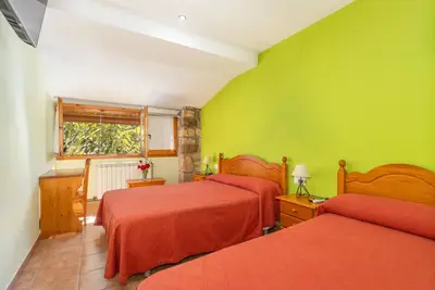 Image de Chambre « Habitació Triple » avec vue sur la montagne, Wi-Fi et climatisation