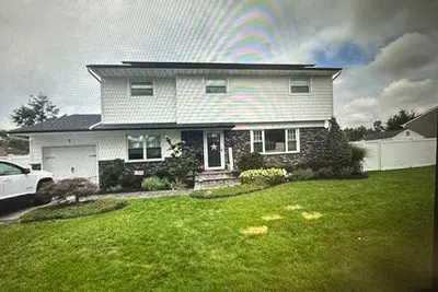 Image de Ryder Cup House. Updated 4 Br home Located in Bethpage 1 mile from Golf course.