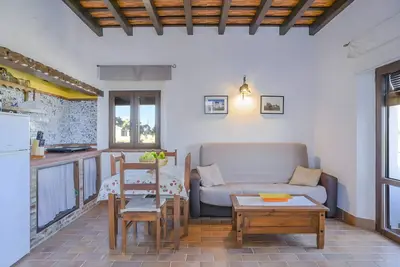 Image de Appartement 'El Pino' avec piscine partagée, climatisation et Wi-Fi