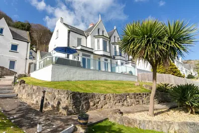 Image de Holiday Home in central Llandudno, on site parking + all bedrooms are ensuite!