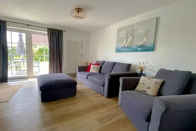 Image de Ostfreesenstuuv max. 4 person in the heart of Neßmersiel Terrace, garden, Wlan- Wallbox