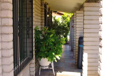 Image de A lovely place, 4-bedroom house with Bbq Ramada