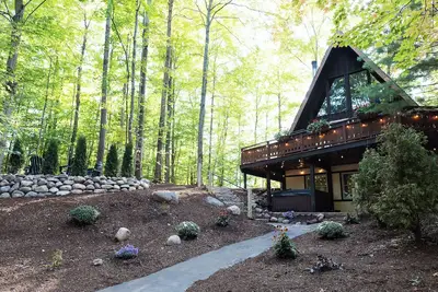 Image de Unique A-frame, hot tub, firepit, barrel sauna