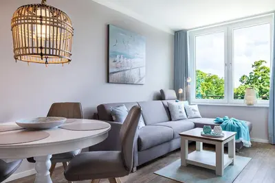 Image de Comfortable apartment with covered balcony and wellness area in Travemünde