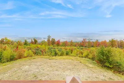 Image de Spacious mountain retreat with fire pit, hot tub, sauna, and foosball