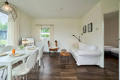 Image de Vacation home by the lake in Süsel with terrace and modern furnishings