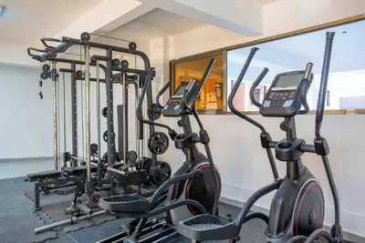 Image de Cozy 1Bdr with gym and golf simulator, Yaya center