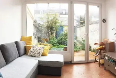 Image de Maison avec jardinet fleuri près de la plage