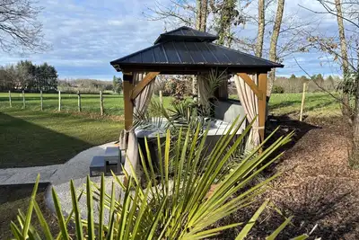 Image de La Pierre Dorée - Jacuzzi privatif - Escapade romantique ou familiale Dordogne