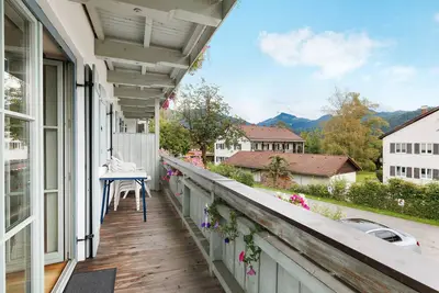 Image de Appartement 'Fewo Brünnstein- Nr 28 Piscine, Sauna' avec vue sur la montagne, jardin commun et Wi-Fi