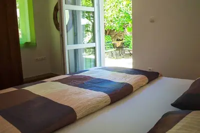 Image de Appartement de deux chambres prés de la plage Postira, Brac (A-24897-c)