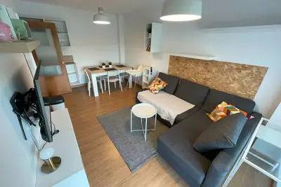 Image de Appartement entre vagues et prairies avec vue sur la montagne et terrasse privée