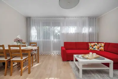 Image de Sempołowskiej 68 Wrocław | Red Apartment with Desk for Remote Work