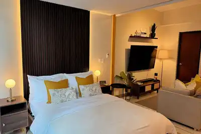 Image de Netflix and Chill Cozy 1br Suite in Bgc