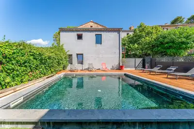 Image de Maison de vacances 'Côté Cour' avec piscine partagée, terrasse privée et Wi-Fi