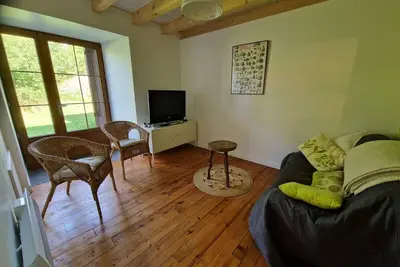 Image de Gîte 'Chez Marie-Louise' avec terrasse privée et jardin commun
