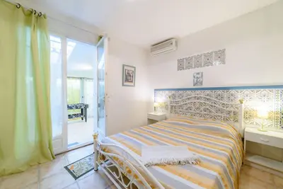 Image de Chambre d'hôtes 'Chambre Double Classique' avec jardin commun et climatisation