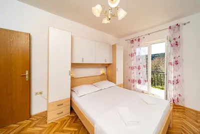 Image de Appartement de trois chambres avec le balcon Lopar, Rab (A-24754-b)