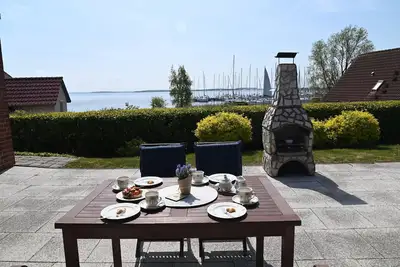 Image de Maison de vacances 'Boddenperle' avec vue sur la mer, terrasse privée et Wi-Fi