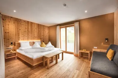 Image de Appartement 'Chalet Rudana pour 4 personnes' avec vue sur la montagne, jardin commun et Wi-Fi