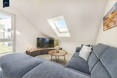 Image de FeWo Kleckerburg - Modern vacation apartment with balcony & underground parking - near the beach