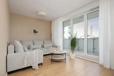 Image de Wita Stwosza 48 | Warsaw | Spacious Apartment with Parking Balcony | Next to Metro