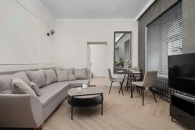 Image de Komuny Paryskiej 14 Wrocław | Beige Apartment with Home Office