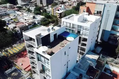 Image de Americana Loft - Rooftop, Pool & Gym 2 Br Sleeps 6