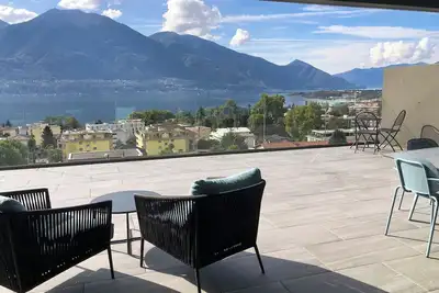 Image de Luxurious 5-Star Apartment with Exceptional Lake and Mountain Views in Minusio