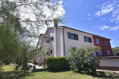 Image de Appartement de vacances avec deux chambres et un balcon dans un quartier calme près d'Umag