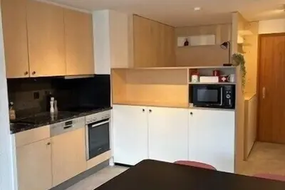 Image de Extérieur : Appartement lumineux et chaleureux, orienté plein sud, avec terrasse aménagée et vue exc