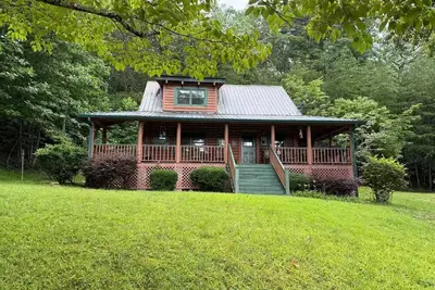 Image de Storybook log cabin Blue Ridge Mountains Nc