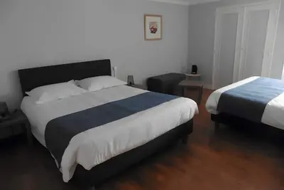 Image de Chambre d'hôtes 'Chambre Ferrari' avec terrasse partagée, jardin partagé et Wi-Fi