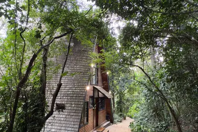 Image de Kivulini A-Frame Cabin Forest-Wake to 360° forest views in a reimagined retreat.