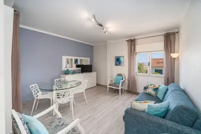 Image de Maison de vacances 'Beach Apartment On The Beach' avec terrasse partagée, Wi-Fi et climatisation