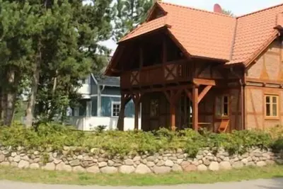Image de Windhuus-Exclusive half-timbered house on the Wieker Bodden with sauna and lighthouse view