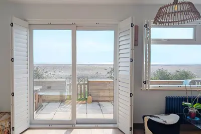 Image de A bungalow that sleeps 10 guests  in 3 bedrooms